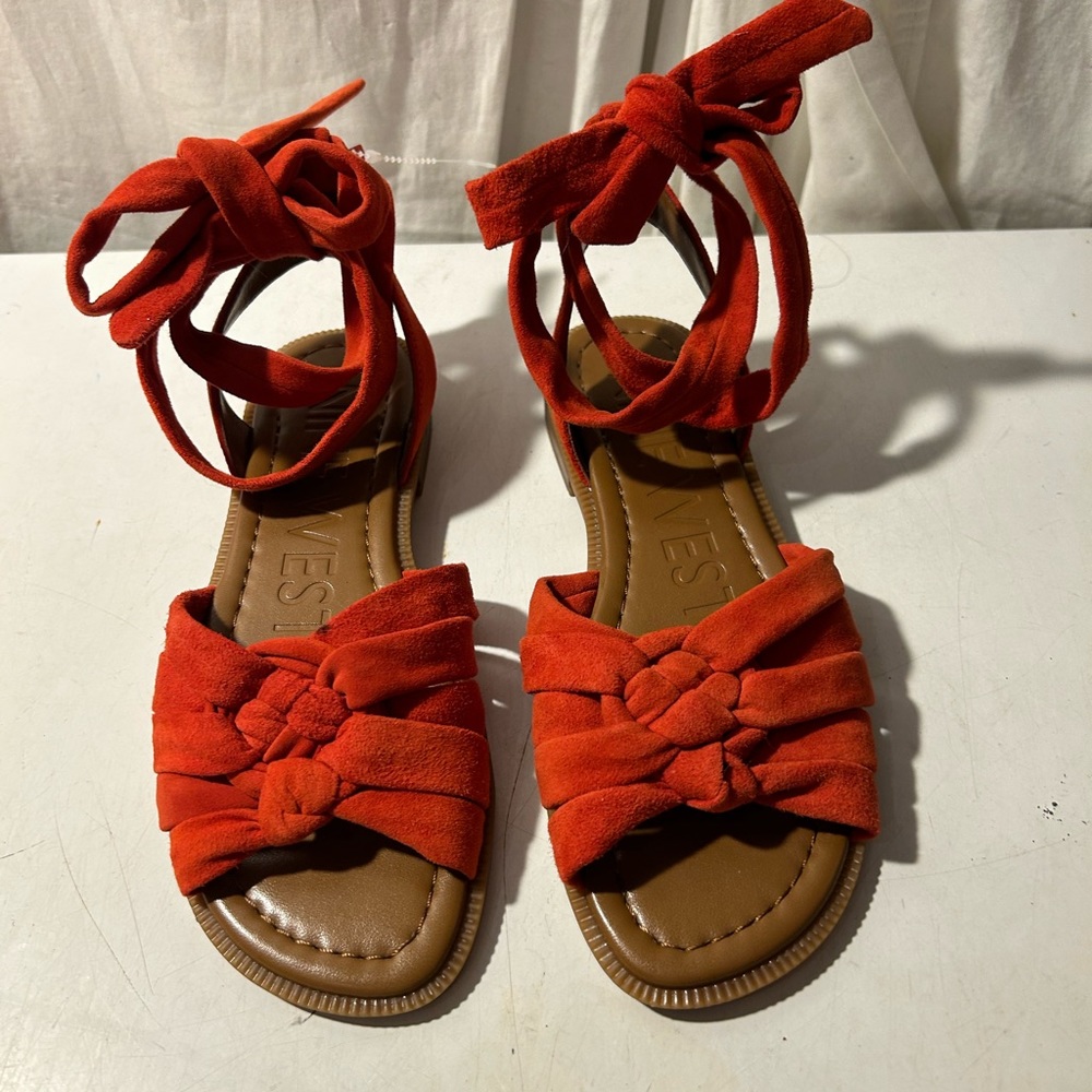 Nine West orange flat sandals with wrap around ankle straps size 6 NWT